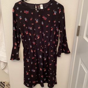 H&M black dress with floral print.